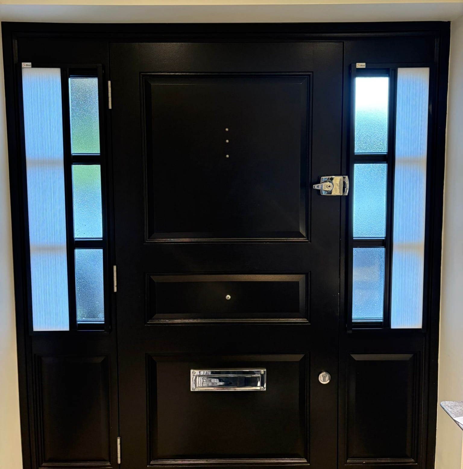 Blind Screen Blinds for Front Doors and Sidelights Blind Screen blackout blinds fitted to front door sidelights by John’s Blinds & Curtains, providing privacy, insulation and energy efficiency.