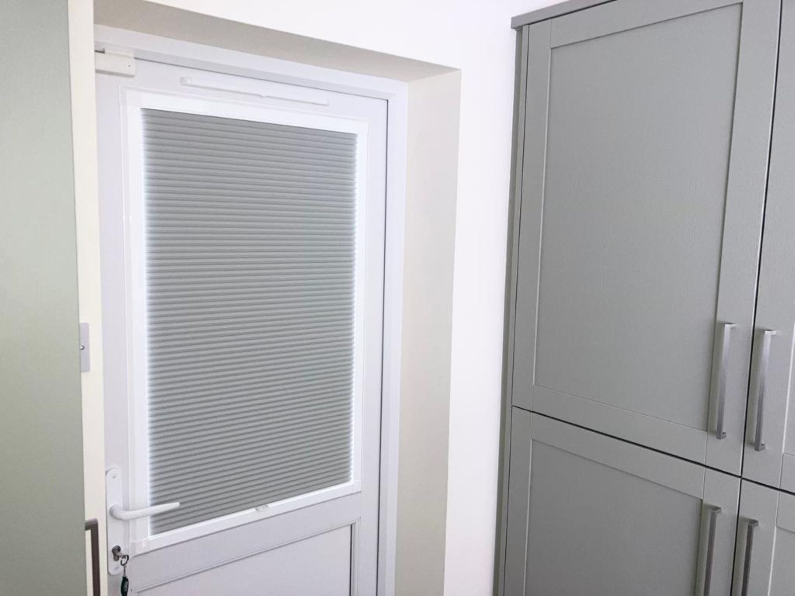 Energy saving multi-zone Cellular Blinds fitted on patio doors, helping reduce heat loss and maintain room temperature.