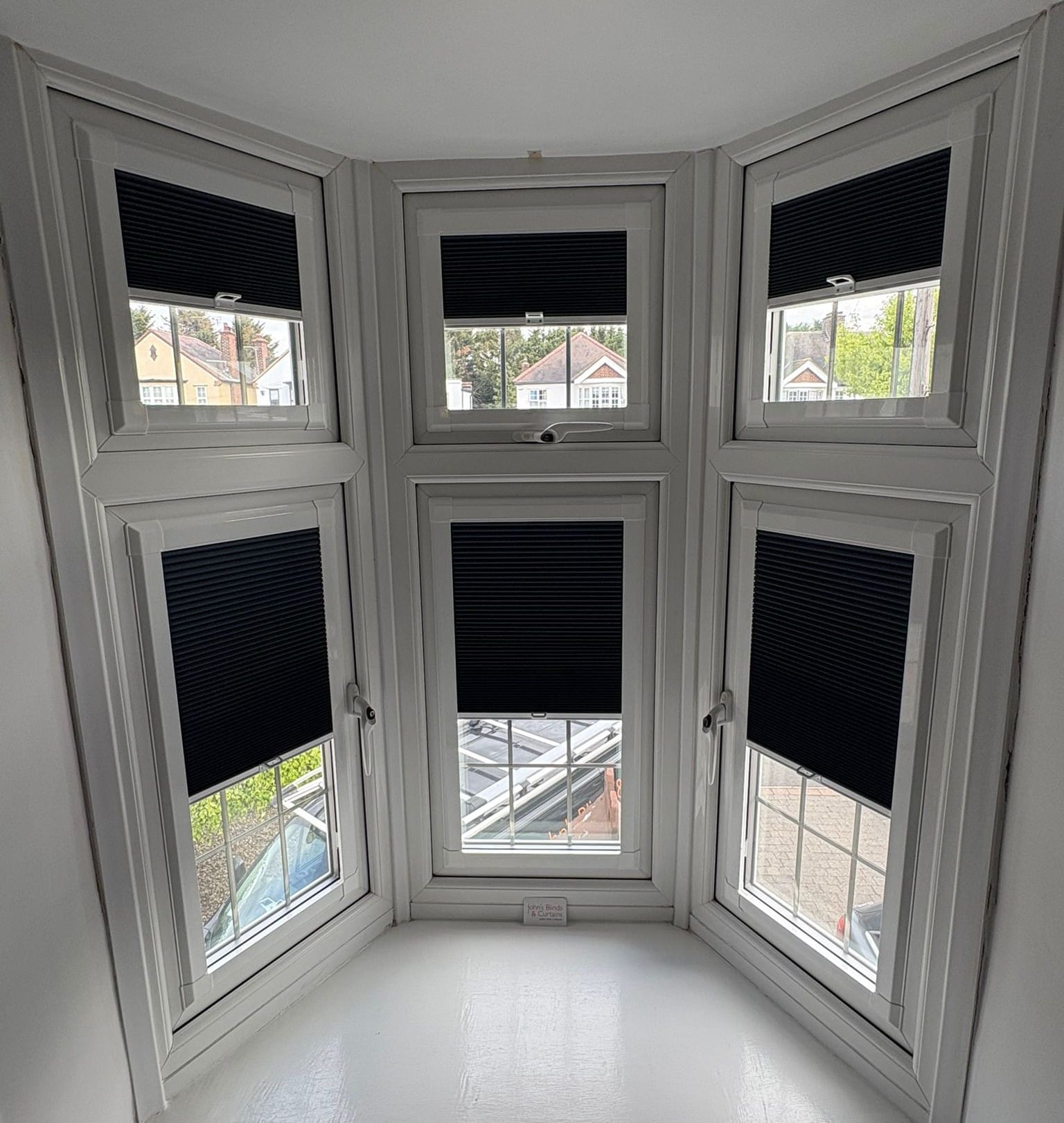 Perfect Fit Cellular Blinds for Bay Windows Perfect Fit Cellular Blinds fitted to a uPVC bay window by John’s Blinds & Curtains, offering thermal insulation, privacy and a precise made-to-measure finish.