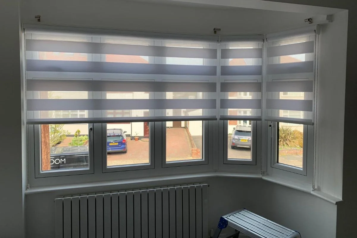 White Day & Night Blinds in Bedroom Bay Window