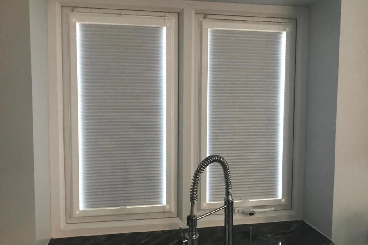 perfect-fit-cellular-blind-kitchen-sink-window Perfect Fit blind installed on windows near kitchen sink