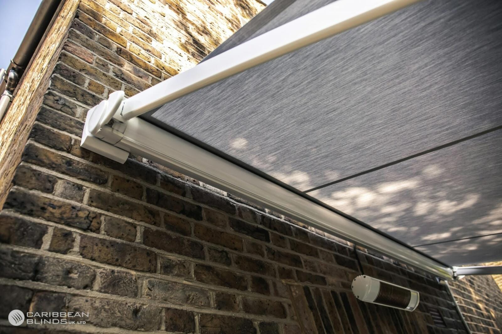Tortola patio awning with optional infrared heater mounted beneath cassette