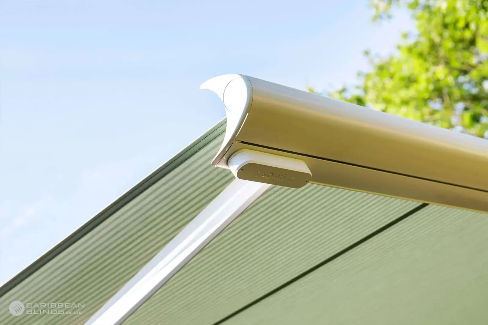 Close-up of Anguilla patio awning full cassette and extended acrylic fabric canopy