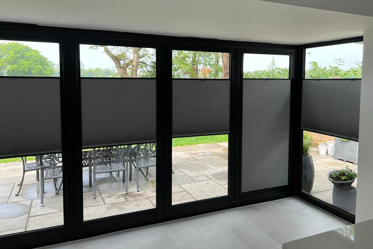 Perfect Fit multi-zone cellular blinds installed on bifold doors