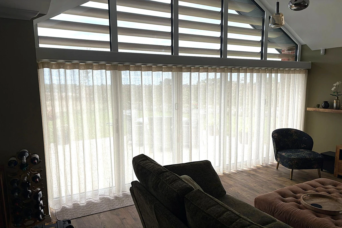 sheer wave curtains installed across bifold doors