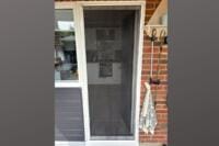 Fly screen fitted to a back door using a made-to-measure blind screen system in a UK home