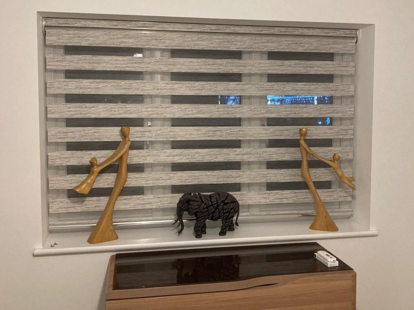 Modern Contemporary Styling with Day & Night blinds Grey Day & Night blind fitted within a modern contemporary living space.