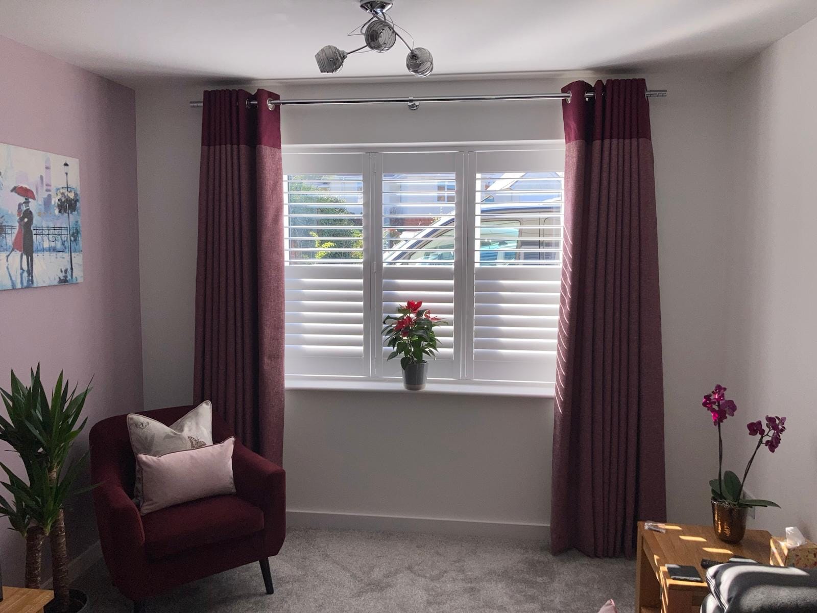 Eyelet Curtains with Plantation Shutters in Essex Home Bespoke eyelet curtains installed with plantation shutters in a modern Essex home