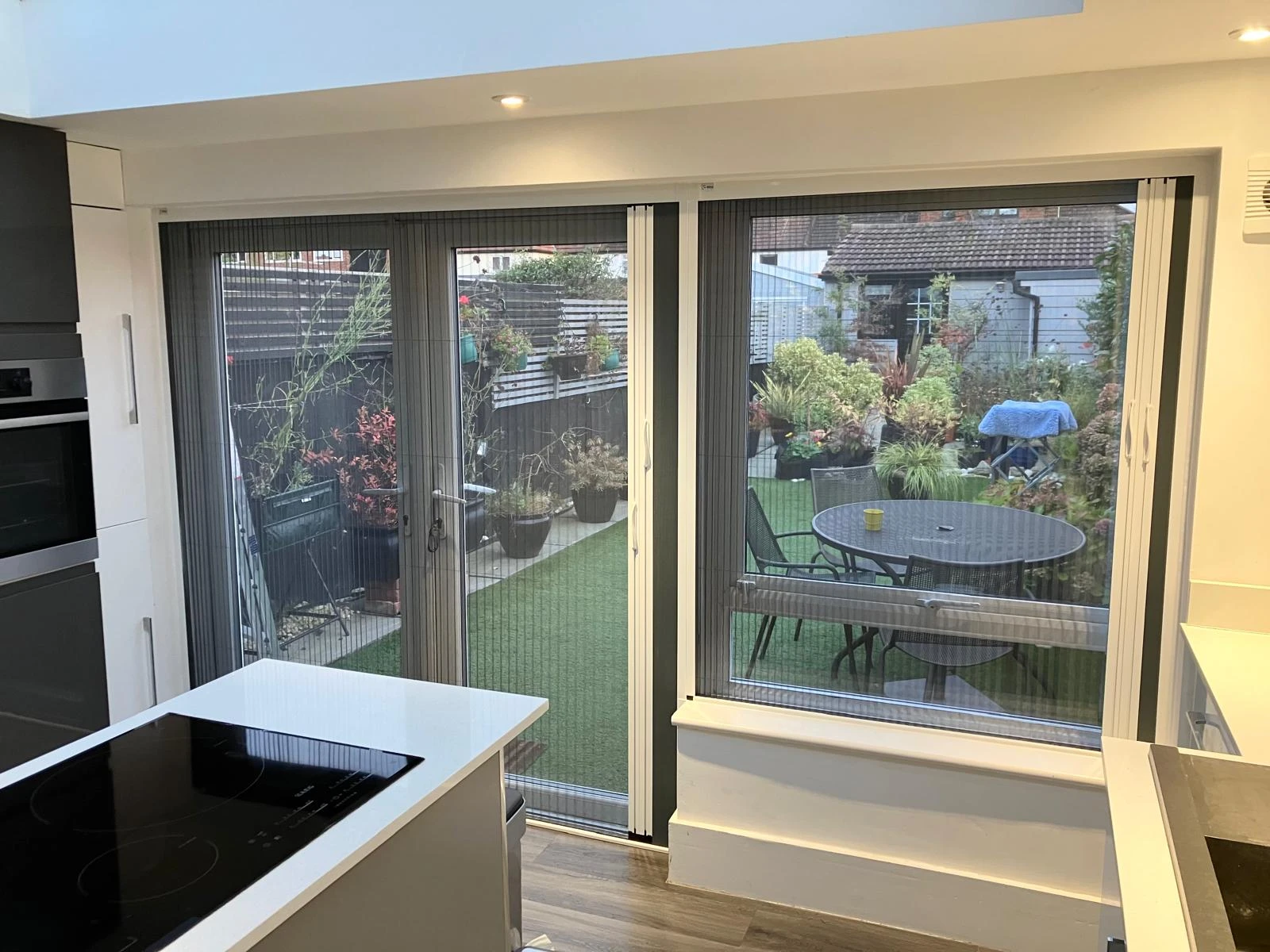 Integrated Fly Screen systems for kitchen windows and doors, helping allow fresh air and ventilation while keeping unwanted insects outside.