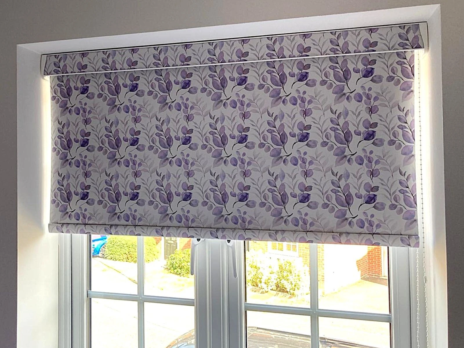 Custom patterned Anycolour roller blind fitted within a modern Essex home.