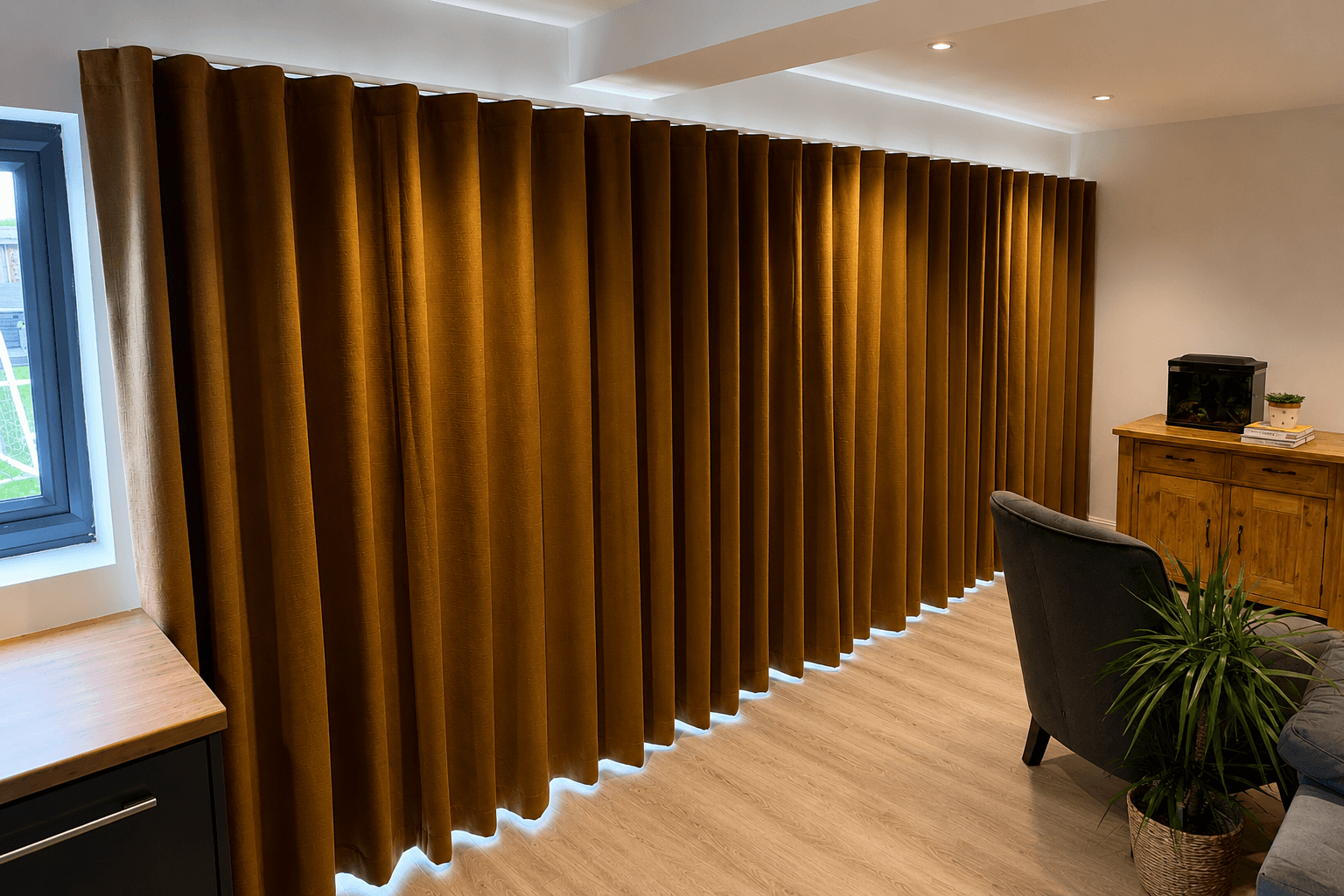 Made-to-measure wave curtains installed in a modern living room, showcasing elegant drape and a premium finish.