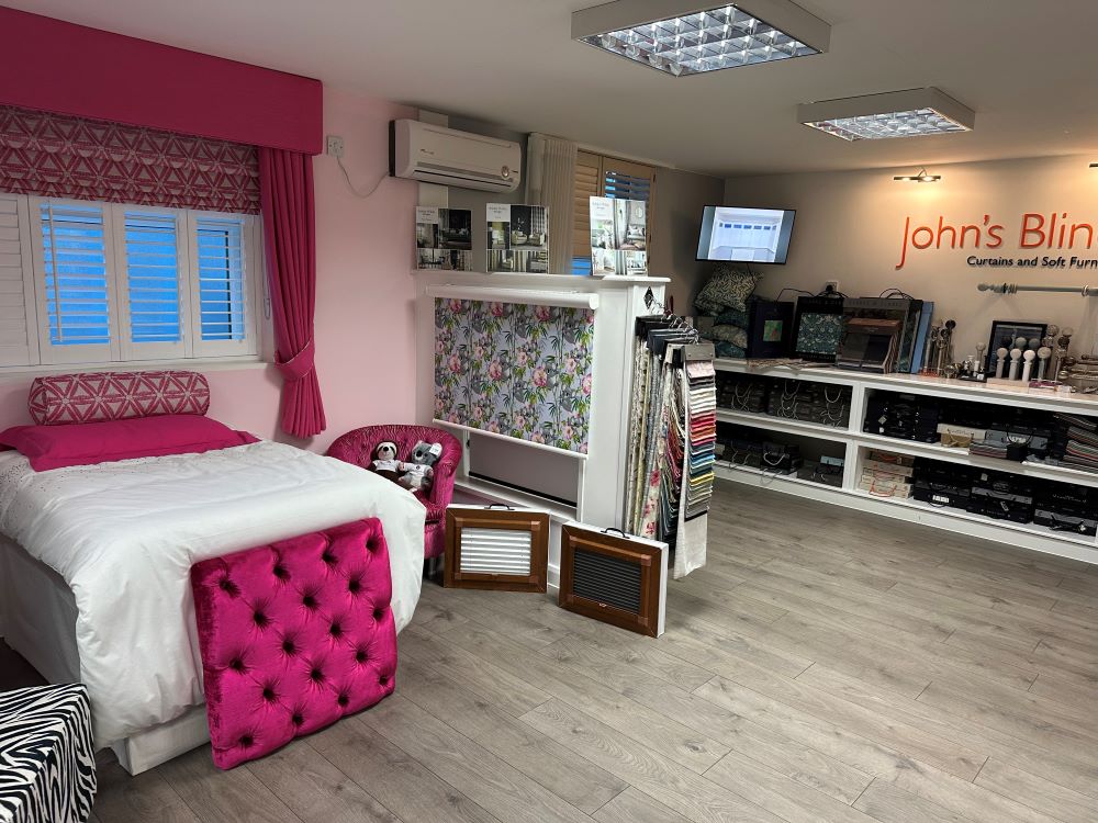 Display area inside John’s Blinds & Curtains showroom showcasing made-to-measure window dressings.