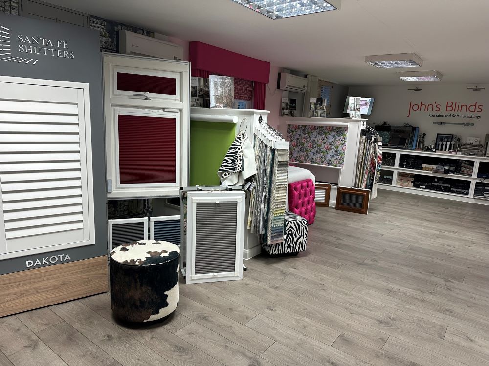 Made-to-measure blinds and curtains on display inside John’s Blinds & Curtains Wickford showroom.